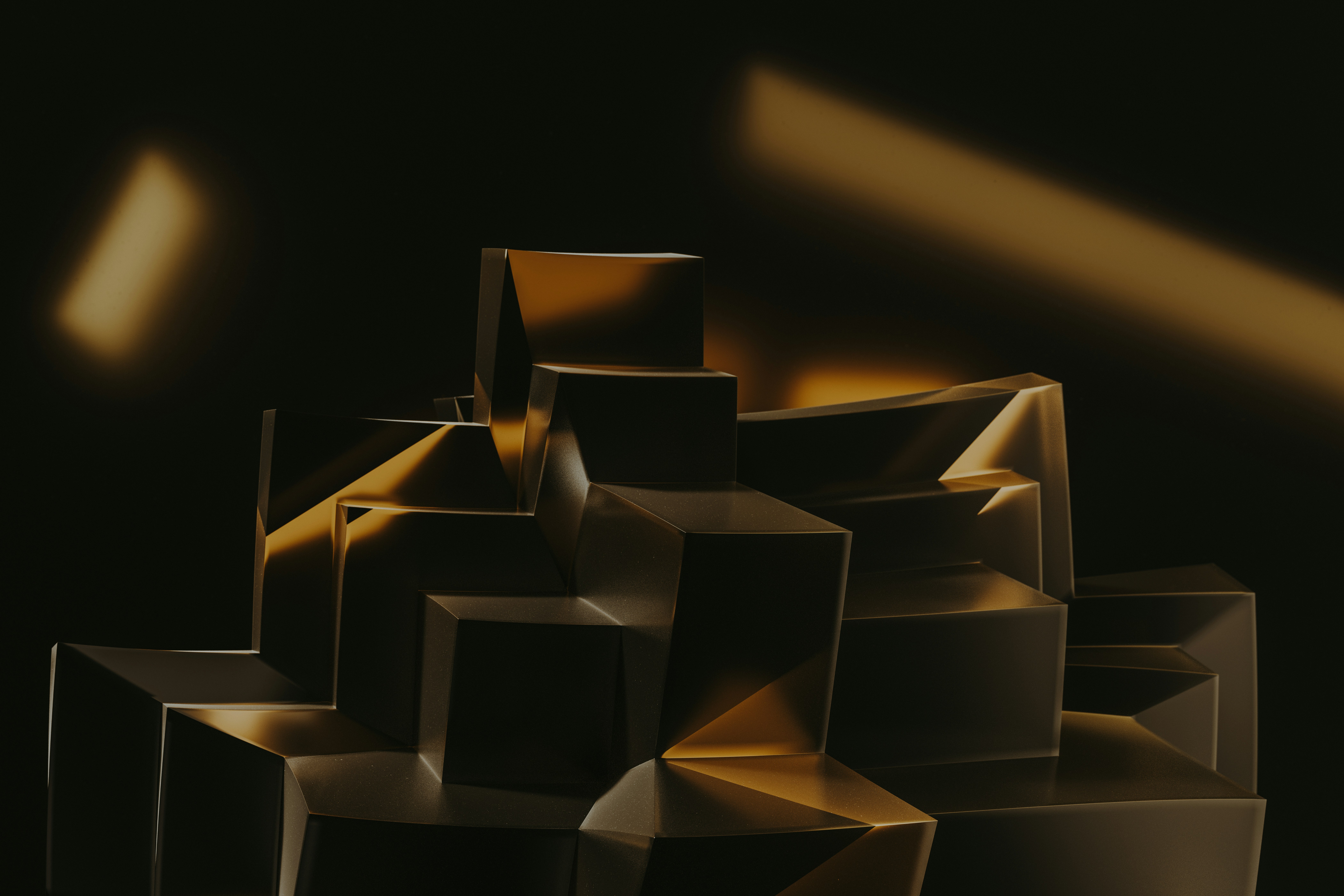 a black and gold abstract painting of cubes